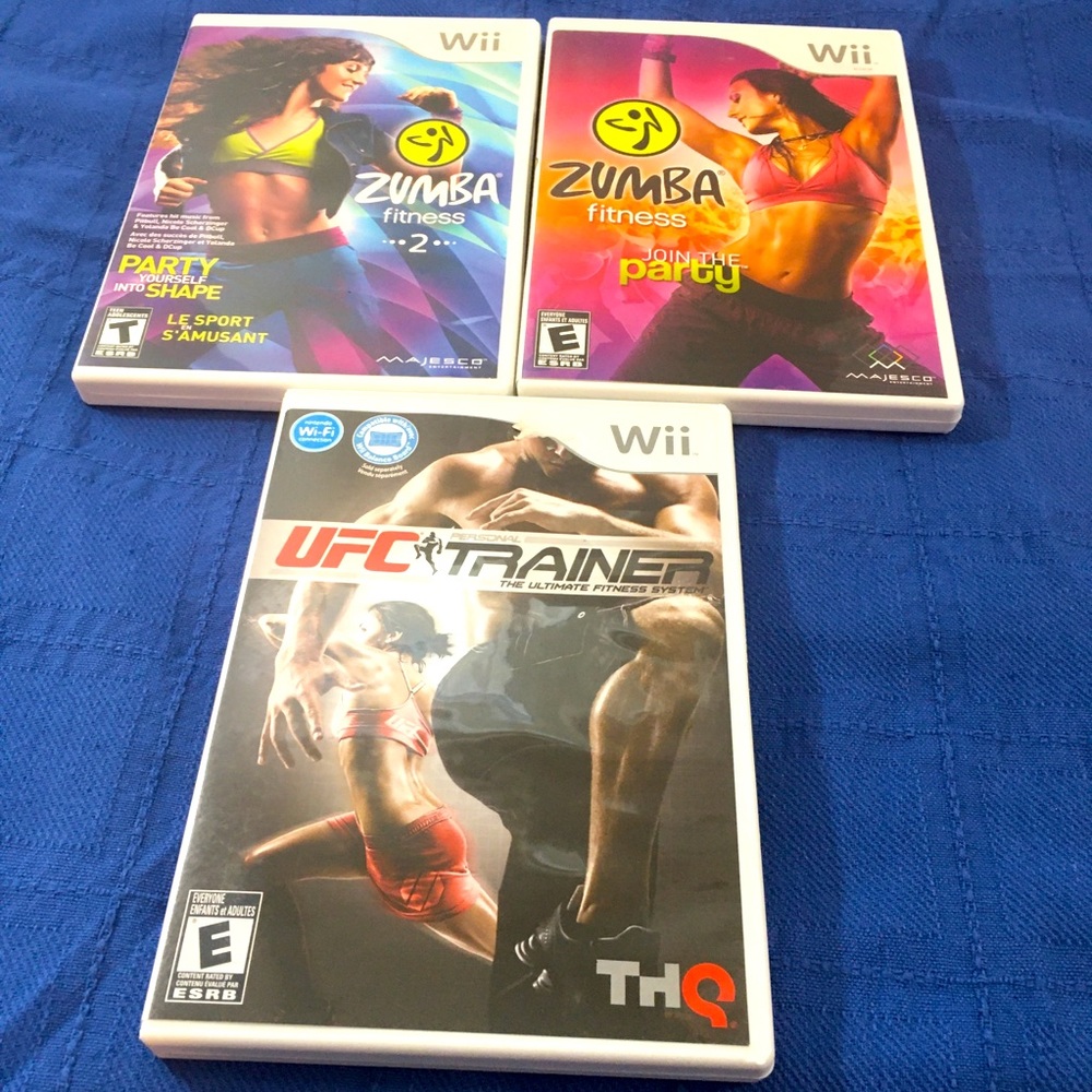 Wii fit Zumba and ufc trainer. No belts included.